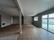 Large open living space with tile flooring and view of a private pool at 1338 Smoke Tree Ave, Las Vegas, NV 89108