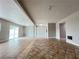 Large open living space with tile flooring and access to sliding door at 1338 Smoke Tree Ave, Las Vegas, NV 89108