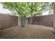 Low-maintenance backyard featuring gravel and decorative rock landscaping, ideal for easy care at 1598 Cowboy Chaps Pl, Henderson, NV 89002
