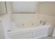 Relaxing bathroom with a jacuzzi tub, chrome fixtures and a bright, clean design at 1598 Cowboy Chaps Pl, Henderson, NV 89002
