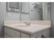 Bathroom featuring a white sink vanity with a silver faucet and a large mirror at 1598 Cowboy Chaps Pl, Henderson, NV 89002