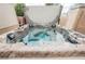 Luxurious hot tub with jets and water features, perfect for relaxation at 1598 Cowboy Chaps Pl, Henderson, NV 89002
