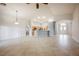 Spacious living room showing entry archway and eat-in kitchen at 1598 Cowboy Chaps Pl, Henderson, NV 89002