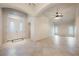 Spacious living room with tile flooring and a light and airy ambiance at 1598 Cowboy Chaps Pl, Henderson, NV 89002