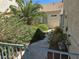 A walkway with desert plants leading to the front door of the house at 2253 Van Gogh Dr, Henderson, NV 89074