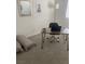 A modern office with a sleek desk, comfortable chair, and bright natural light at 2755 Atomic Tangerine Way # 2, Las Vegas, NV 89183