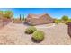 Spacious backyard featuring low-maintenance landscaping and mature trees, providing a serene outdoor setting at 3001 Walnut Park Ct, Henderson, NV 89052