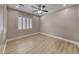 Bright bedroom featuring recessed lighting, a ceiling fan, and a window with plantation shutters at 3001 Walnut Park Ct, Henderson, NV 89052