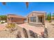 Beautiful exterior with manicured front yard, desert landscaping, and a well-maintained facade at 3001 Walnut Park Ct, Henderson, NV 89052