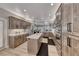 Spacious kitchen features wood cabinets, stainless steel appliances and center island with white countertop at 3001 Walnut Park Ct, Henderson, NV 89052