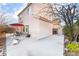 The backyard features a concrete patio, seating, desert landscaping, brick edging and is fully fenced at 4542 Silver Bit Ct, North Las Vegas, NV 89032