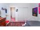 Bedroom with a rug and gray bedding at 4542 Silver Bit Ct, North Las Vegas, NV 89032