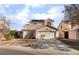 Charming two-story home featuring a well-maintained yard, two-car garage and solar panels at 4542 Silver Bit Ct, North Las Vegas, NV 89032