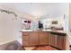 Open kitchen design with granite countertops and stainless steel appliances at 4542 Silver Bit Ct, North Las Vegas, NV 89032