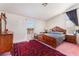 Bright bedroom featuring a decorative rug, wooden furniture, and natural light at 4542 Silver Bit Ct, North Las Vegas, NV 89032