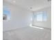 Bright bedroom with multiple windows and neutral carpet at 860 Echelon St, Las Vegas, NV 89138