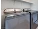 Modern gray front load washer and dryer featuring digital controls at 860 Echelon St, Las Vegas, NV 89138