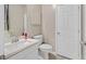 Clean bathroom featuring a modern vanity, white toilet, and neutral wall colors at 949 Bayberry Ridge St, Henderson, NV 89052