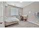 Cozy bedroom featuring a comfortable bed, study desk, and soft natural light at 949 Bayberry Ridge St, Henderson, NV 89052