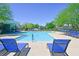 Relaxing community pool with plenty of lounge chairs and shaded areas at 949 Bayberry Ridge St, Henderson, NV 89052