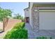 Paver pathway leading to front door, complemented by stone accents and lush greenery at 949 Bayberry Ridge St, Henderson, NV 89052
