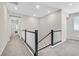 Upstairs hallway with neutral walls, plush carpeting, and access to multiple rooms at 949 Bayberry Ridge St, Henderson, NV 89052