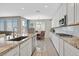 Well-appointed kitchen showcasing a large island, stainless steel appliances, and ample cabinet space at 949 Bayberry Ridge St, Henderson, NV 89052