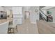 Open kitchen with granite counters, stainless appliances, and barstool seating at 949 Bayberry Ridge St, Henderson, NV 89052
