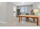 Bright office features a large window, tile floors, and a wooden desk at 949 Bayberry Ridge St, Henderson, NV 89052