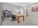 Bright office features a large window, tile floors, and a wooden desk at 949 Bayberry Ridge St, Henderson, NV 89052