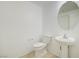 Powder room featuring a pedestal sink and tiled floors at 2120 Waterlily View St, Henderson, NV 89044