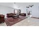 Spacious living room featuring marble floors, neutral walls, and elegant traditional-style furniture at 2419 Country Orchard St, North Las Vegas, NV 89030