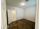 The carpeted bedroom has a window, a closet, and neutral color palette at 4117 Midnight Crest Ave, North Las Vegas, NV 89031