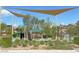 A community playground featuring modern equipment, shade, landscaping, and common space at 4117 Midnight Crest Ave, North Las Vegas, NV 89031