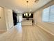 Bright kitchen featuring a center island with bar seating and black appliances at 4117 Midnight Crest Ave, North Las Vegas, NV 89031