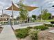 Community playground featuring climbing wall, slide, and shade canopies at 4117 Midnight Crest Ave, North Las Vegas, NV 89031