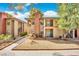 Attractive two-story exterior with private balconies and well-maintained landscaping at 5576 W Rochelle Ave # 9C, Las Vegas, NV 89103