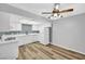 Modern kitchen with white cabinetry and appliances at 5576 W Rochelle Ave # 9C, Las Vegas, NV 89103