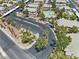Overhead perspective of community featuring landscaping, parking, and a clear view of residential buildings at 5710 E Tropicana Ave # 1184, Las Vegas, NV 89122