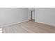 Spacious bedroom with wood-look floors and neutral wall paint at 5710 E Tropicana Ave # 1184, Las Vegas, NV 89122