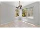 Open dining room with decorative chandelier and natural light at 5710 E Tropicana Ave # 1184, Las Vegas, NV 89122