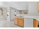 Well-lit kitchen featuring stainless steel sink and ample counter space at 5710 E Tropicana Ave # 1184, Las Vegas, NV 89122