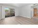 Spacious living room features hard surface floors and sliding glass doors to the patio at 5710 E Tropicana Ave # 1184, Las Vegas, NV 89122