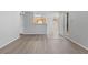 Open-concept living space with hard surface floors, light paint and easy access to kitchen at 5710 E Tropicana Ave # 1184, Las Vegas, NV 89122
