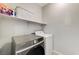 Functional laundry room equipped with modern Samsung washer and dryer at 6057 Leaping Foal St, North Las Vegas, NV 89081