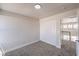 This is a cozy bedroom with plush carpeting and a closet with sliding doors at 9321 Dancing Daffodil Ave, Las Vegas, NV 89129