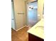 Bright bathroom offers a double sink vanity and tile flooring at 10450 Badger Ravine St, Las Vegas, NV 89178