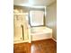 Bright bathroom features a glass enclosed shower and a large soaking tub at 10450 Badger Ravine St, Las Vegas, NV 89178