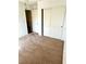 Bedroom featuring a ceiling fan and large closet doors at 10450 Badger Ravine St, Las Vegas, NV 89178