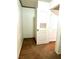 Walk-in closet features neutral carpet and custom shelving for storage and organization at 10450 Badger Ravine St, Las Vegas, NV 89178